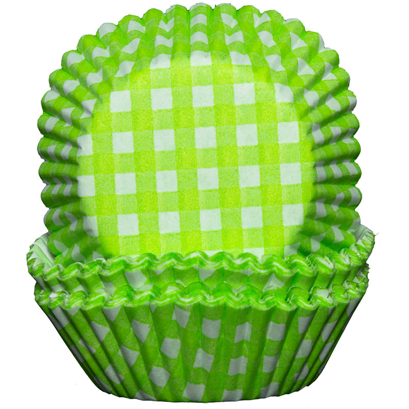 Green and white checkered cupcake liner on a white background